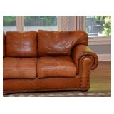 $800 - Leather 4-Seat Sectional Sofa with Nailhead Trim, 2 Pieces (some discoloration and wear)