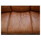 $800 - Leather 4-Seat Sectional Sofa with Nailhead Trim, 2 Pieces (some discoloration and wear)