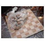Stone Chessboard and Carved Pieces