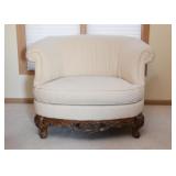 Off-White Upholstered Chair & a Half with Wood Carved Base (Approx. 53" L x 34.5" H at the back)