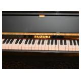 Beautiful Black Lacquer Suzuki Upright Piano with Brass Details (it comes with a piano bench, not sh