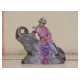 Man on Elephant Figurine