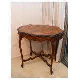 Vintage Parlor Table with Carved Details