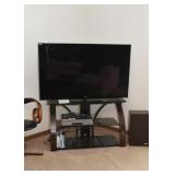 Flatscreen TV and TV Stand