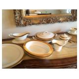 12 place settings plus serving pieces