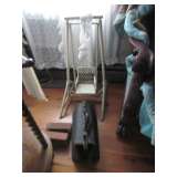 Antique wicker doll swing