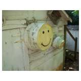 WASH TUBS TURNED INTO YARD ART