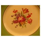 K2 12 floral plate 8" across. Matches with tea pot.