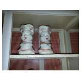 Pair unmarked McCoy pig pitchers