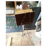 Early ornate iron book stand