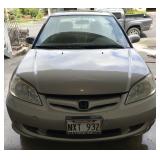 This is a 2005 Honda Civic EX 4-door sedan with sunroof
