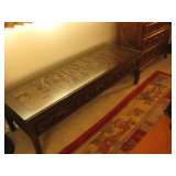 Intricately carved teak coffee table