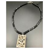 MSS212 - Designer Myrna Lee Chang Black Onyx Necklace w/Antique Cricket Cage Pendant