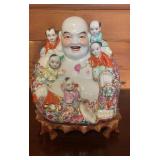 AFC009 - Vintage Chinese Porcelain Laughing Buddha Figure w/ 5Children & Stand