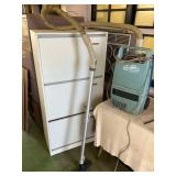 VME033 - Tall Shoe Storage And A Hoover Vacuum