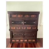 This lot contains a large 59.5" x 17.5" x 66.25" antique looking Japanese wooden tansu cabinet. It l