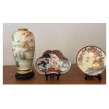 TTK070 - Oriental Porcelain Vase And Decorative Plates with Stands