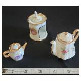 PCT141 - Miniature Tea Pots And Candle Light