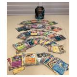 CCS153 Over 500 Pokémon Trading Cards With Storage Tin