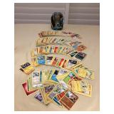 CCS173 Over 500 Pokémon Trading Cards In Storage Tin