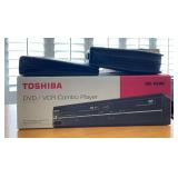 NVN070- Toshiba DVD Player And Two Cases Of DVD Movies