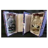 NVN110 - Pair of Reverse Painted Snuff Bottles 