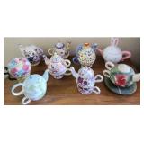 PPP244 - Collection of Tandem Teapot/Teacup Combinations