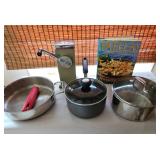 AAT004-Amazing Assortment Of Pots/Pans, Ice Crusher And Paella Cookbook