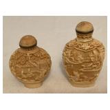 MMM125 Two Carved Ivory Colored Snuff Bottles