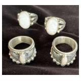 NSJ111 - Four Navajo Hand Crafted Rings Sz 7 With Opal