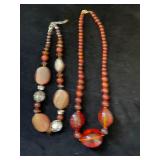 AWT082 - Two Amber-Colored Necklaces AWT082 - Two Amber-Colored Necklaces