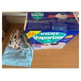 AAA129 Vicks Vaporizer And Heating Pads 