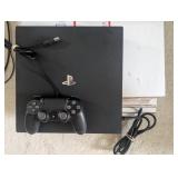 WST044 (1) PS4 PlayStation 4 Gaming System, DVD Vault and Accessories.