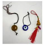 EHE052 - Multi lot of assorted spiritual/cultural amulets & keychains 