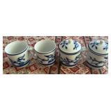 SAT113 - Four Porcelain Mugs 