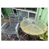 SAT381 - Four Patio Chairs + Round Glass Table