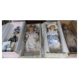 MLE180 Four Large Collectible Porcelain Dolls in Box