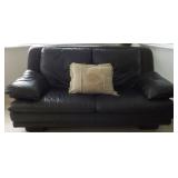 MHLE024 Black Natuzzi Leather Loveseat with Beige Throw Pillows