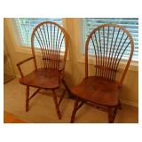 Two of four fan back chairs 