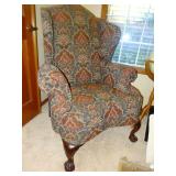 Wing back chair with talon and ball feet. Very comfortable