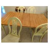 panel top dining table with leaf and four side chairs