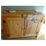 hand painted decoration on pine cabinet