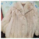 fur coat with leather trim