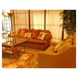 Family room sofa, chair and glass topped coffee table 