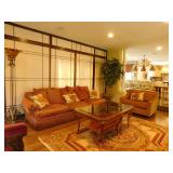 Family room sofa, chair and glass topped coffee table