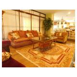 Family room sofa, chair and glass topped coffee table