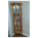 corner curio with curved glass