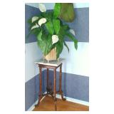 marble and wood plant stand