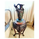 Bronze vase with colored floral accents