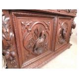 Carvings on Rococo/Baroque style china cabinet